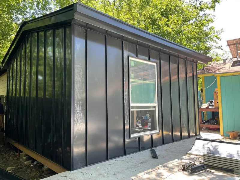 Black standing seam metal wall panels for Metal Roof Installation in Narragansett