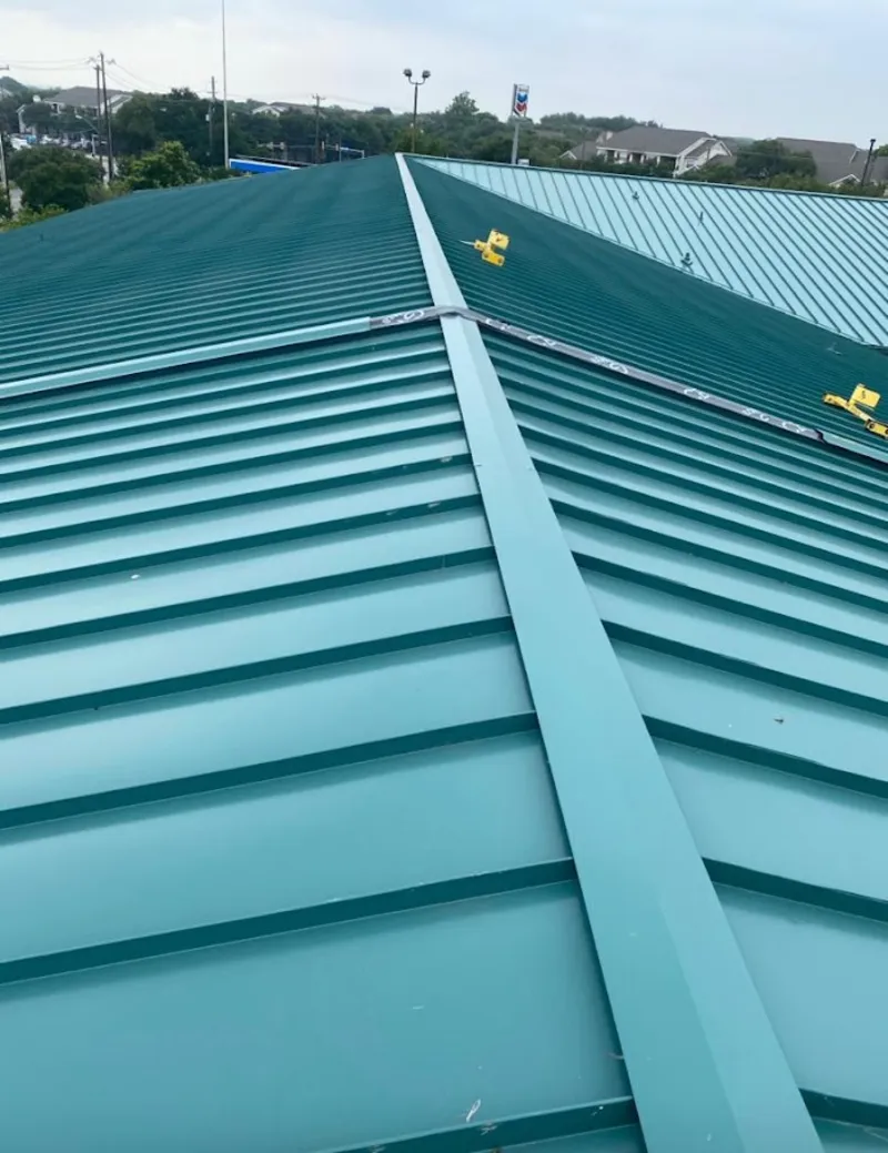 Green commercial metal roof ridge and valley for Metal Roof Repair in Narragansett